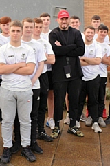 Sonny Bill Williams with students from Hopwood Hall College's Rugby Academy