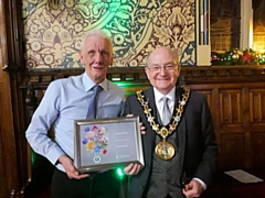 Volunteer Ken Short with the award and Mayor Billy Sheerin