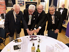 Members of Rochdale Rotary cut the cake