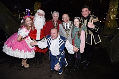 The Mayor and Mayoress (centre) are joined by guests at Rochdale Town Hall for the switch on. (Left to right: Jesamine Oldman, Father Christmas, Mayoress of Rochdale, Mayor of Rochdale, the Mayor’s grand-daughter Eleanor Workman, Shane Nolan, and front: Mike Newman).