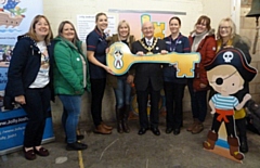 Jolly Josh hosts stay and play sessions for children with disabilities and special needs in Rochdale (pictured: receiving the keys for their premises in 2019)