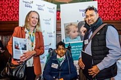 Liz McInnes with Naveed Hafeez (centre) and his dad