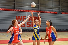 Goal attack Emma (centre) and the rest of the Tameside team overcame tough opposition to secure the first-ever ENG U16's Netball Cup title