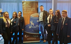 Owner of Bluebird Care John Keogh with students from Whitworth Community High School