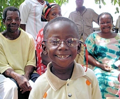 A child benefits from donated old and unused glasses 