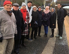 Liz McInnes MP (third left) with local campaigners and commuters at Castleton station this morning