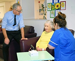 Steve Rumbelow speaking with patient Evelyn Alcock