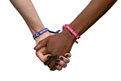 Unity Bands are available in pink, navy or blue from all Cancer Research UK shops 