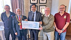 Councillor Faisal Rana and Mayor Mohammed Zaman, present the cheque to Wing Commander David Forbes DL MBE