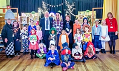 Councillor Ray Dutton and his daughter Sarah at St Margaret’s where pupils and staff dressed in character World Book Day
