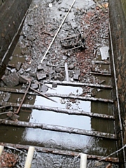 Lock 50  chamber on Rochdale Canal dewatered showing missing wooden floor