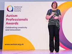 Julie Dalton collecting her award at the event 