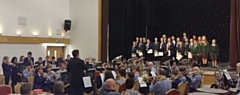 Whitworth Community High School band and choir and 2nd Rossendale Scout Group band entertain at The Riverside in Whitworth