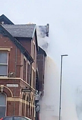 Liquid pouring from the roof at JW Lees brewery