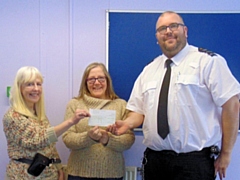 David Roebuck presents Moyra and Deborah with a cheque.jpg