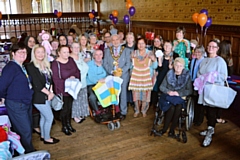 Mayor Mohammed Zaman with knitting groups from across the borough to showcase knitting’s power to weave the borough together