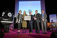 Nicola Kane, TfGM’s Head of Strategic Planning and Research (second from left), Raf Cuesta, TfGM’s Head of Development and Innovation (centre), Cllr Mark Aldred, TfGM’s Chair (second from right)