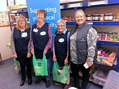 Rochdale Foodbank volunteers with the compostable Co-op carrier bags