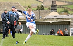 Zac Hartley slots one over from the touchline