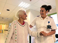 Lynette Cook, activity coordinator on the Wolstenholme Intermediate Care Unit at Rochdale Infirmary, with patient