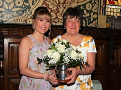 Woman of Rochdale 2019 Carole Kelly is presented with the award by 2018's winner Marilyn Jones