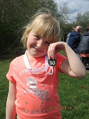 Ella Lockwood with her Hospice to Hospice medal