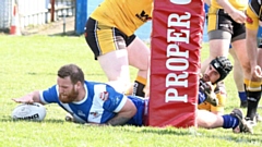 Aidy Gleeson scoring a try for Mayfield