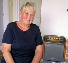 Blind recipient with a specially adapted radio