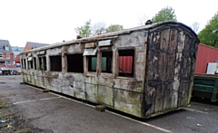 The train body has found a new home at Spotland Mill