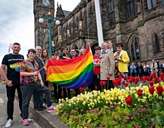 Members of the Rochdale in Rainbows steering group outside the town hall 