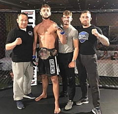 Kyran Sturrock (second left) won bronze at the Mixed Martial Arts European Championships 