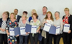 Certificates were presented to the long serving staff members 