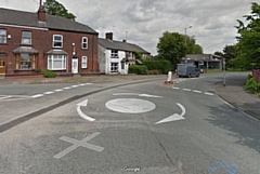 The mini roundabout of Sheriff Street and Falinge Road