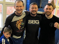 John Kavanagh (centre) with Bellator fighter Martin Stapleton (right) and Glyn Powditch and Ted Powditch 6 (left)