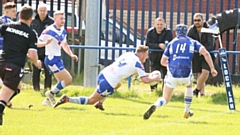 Lewis Butterworth, Mayfield going in for a try against Lock Lane