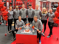 The onePT team with their awards. Back row: Amy Lilles, Tony Williams, John Carroll, Theo Vassiliou, Kallen O’Malley, Katie Trafford, Phil Shepherd. Front row: Angela Golden and Dr Neil Fell