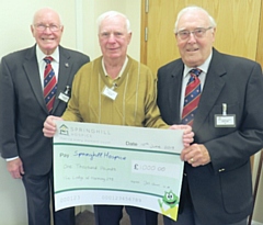 Jack Croll, Peter Miller and Worshipful Master Frank Durns from the Lodge of Harmony no 298 with their cheque for the Hospice