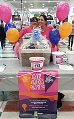 Rachel Byrne, Rochdale Exchange Operations Manager (left) gets stuck into raising money for Great Ormand Street Hospital at the centre’s One Great Day