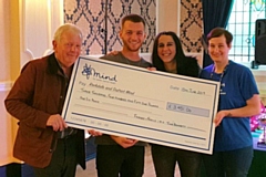 Keith (Tina’s dad), Jordan Davies (Tina’s son) and Claire Pickles (organiser) present a cheque to Paula Hall (Rochdale & District Mind)