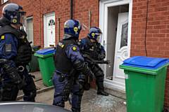 Police daybreak raids in Rochdale