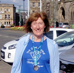 Wendy Mills, Gem Appeal Fundraiser and Trustee, following her Great Manchester Run to raise money for the GEM Appeal