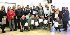 Residents with their certificates following the training programme run Keepmoat Homes and Riverside with former Mayor Mohammed Zaman