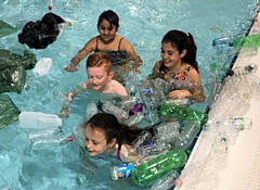 60 children swam through plastic bottles at Middleton Arena