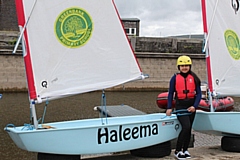 Haleema, with the boat named after her