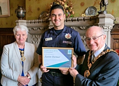 Aaron Palmer presented with a certificate of achievement by the Mayor Billy Sheerin and Mayoress Lynn Sheerin 