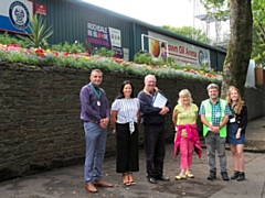 (L-R) Paul Ellison, Rochdale In Bloom Vice Chairman; Frances Fielding, Rochdale AFC Marketing Manager; RHS judge Bernard Pendleton; RHS judge Maxine Lord; Roy Down, Rochdale In Bloom Chairman and Sarah Down, Rochdale In Bloom committee member at the Wonder Wall