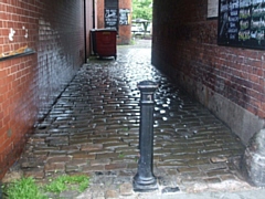 Alleyways, such as this one leading to the Reed, have been cleaned up