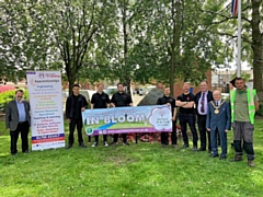 Rochdale Training have installed a bespoke poppy fence around the Castleton War Memorial. Pictured with Mayor Billy Sheerin, and Paul Ellison of Rochdale in Bloom