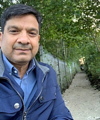 Councillor Faisal Rana with the repaired path