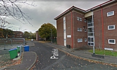 The entrance of Parkfield, Middleton, seen from Weavers Road and Scholars Way, with one block of the Parkfield flats on the right